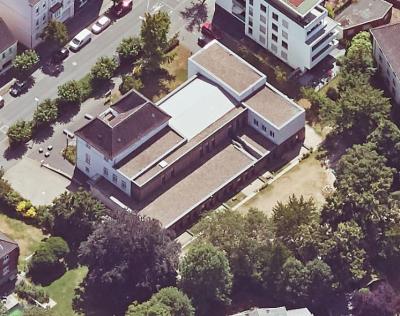 Schrägluftbild von Norden, Umbau ev. Gemeindehaus mit Kindergarten